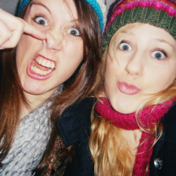 Emma and George pulling faces.